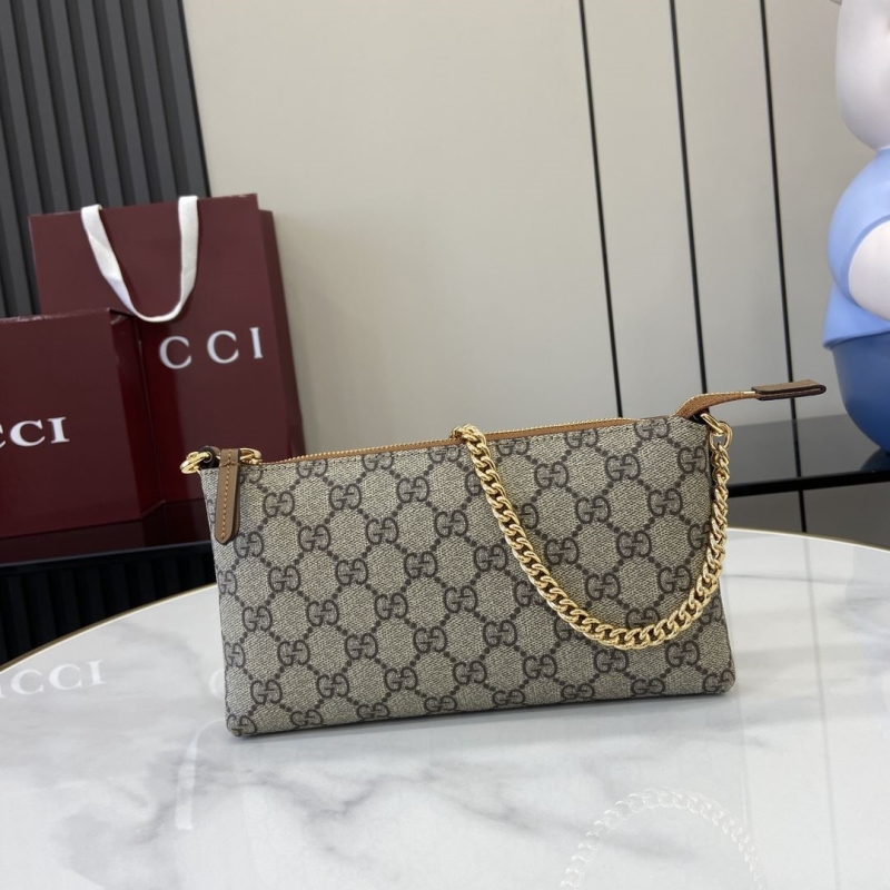 G*u*i clutch bags